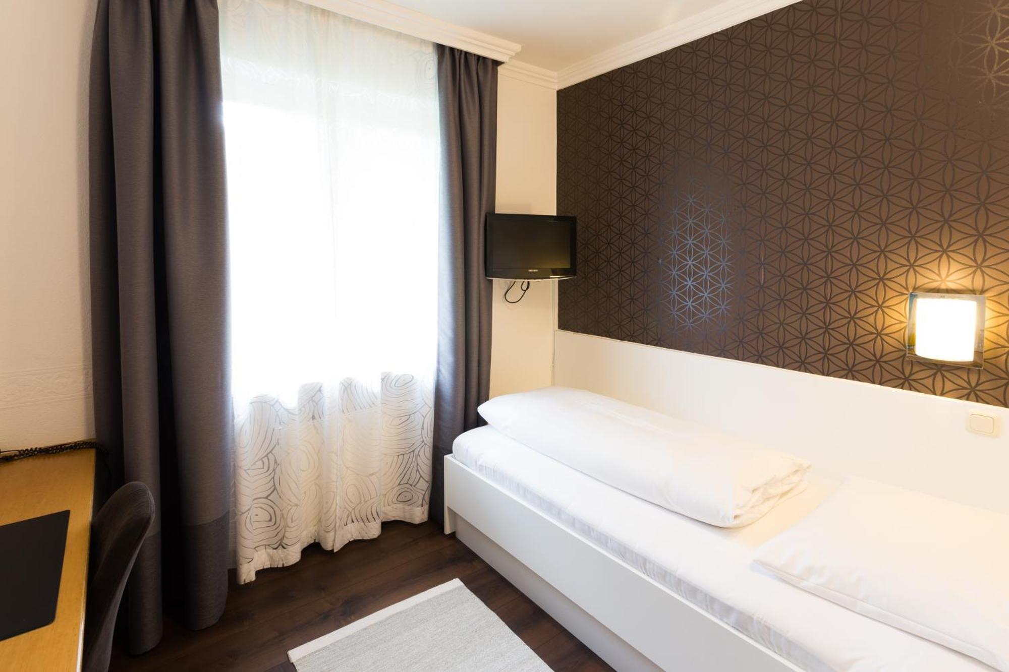 Hotel Villa Solln Munique Quarto foto